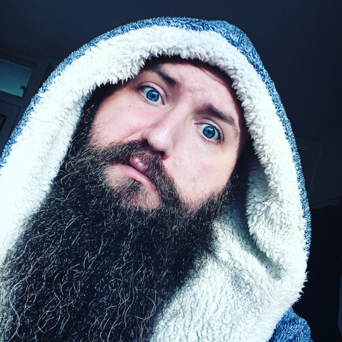 Bald and bearded profile picture